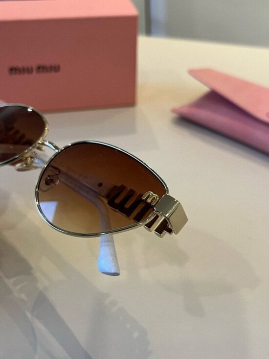 Miu Miu Cat-Eye Glasses with White Frames and Brown Lenses main image 4